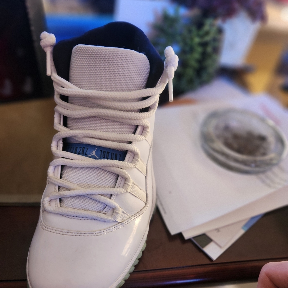 Jordan 13s retro, basically brand new.  I only wore them 3 times, too small